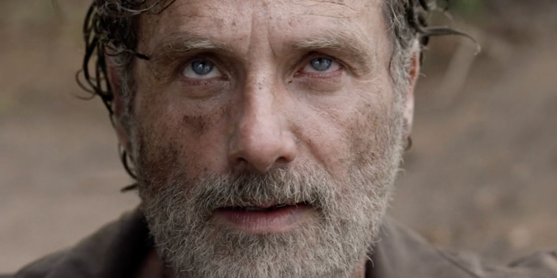 Rick Grimes looks up angrily in The Walking Dead