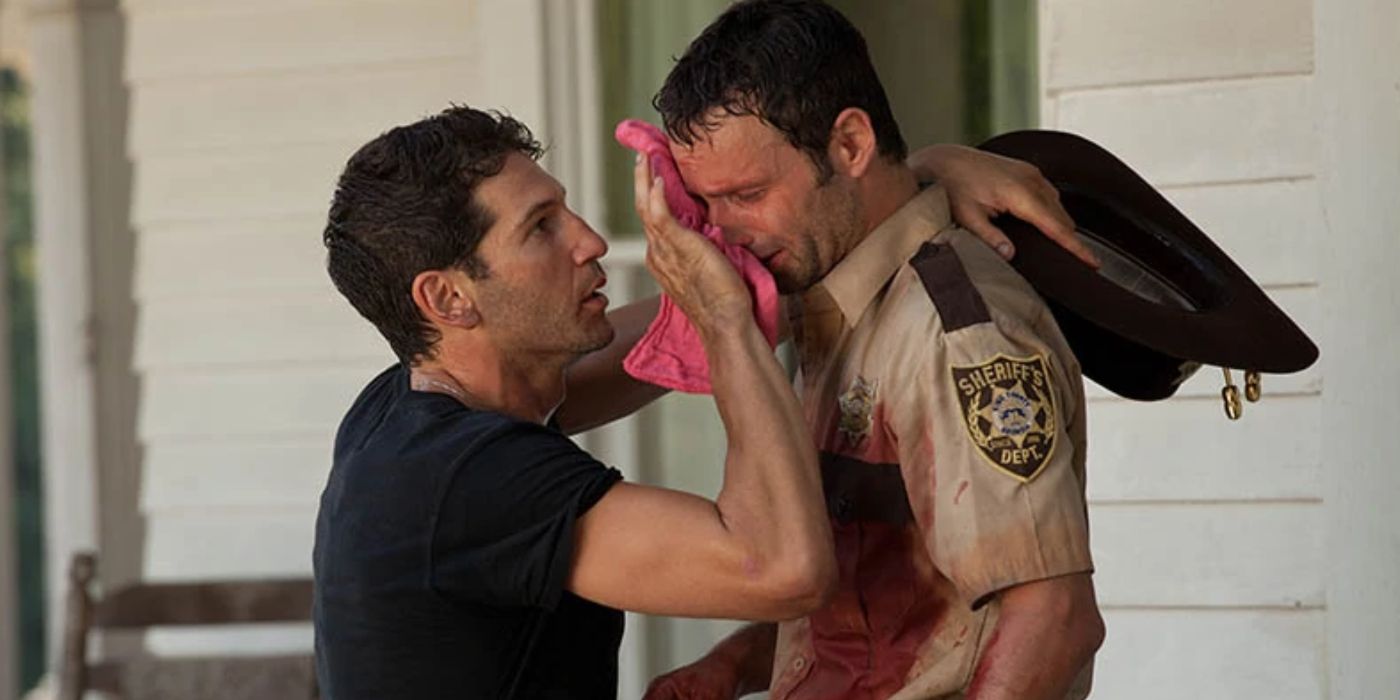 Shane wiping Rick's face with a rag while he's crying and covered in blood in season 2 of The Walking Dead. 