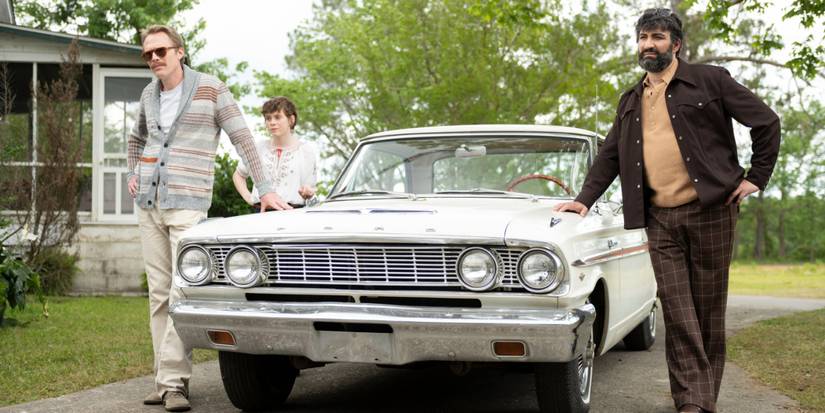 Uncle Frank still featuring the main trio standing by their car.