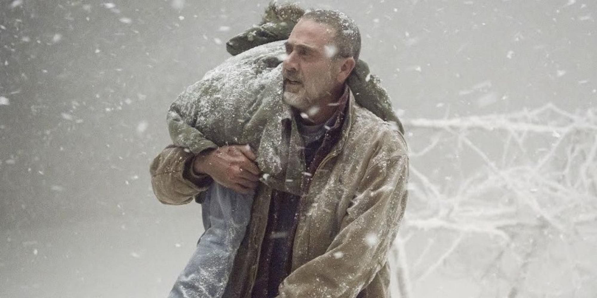 Negan saves Judith from a snow storm in The Walking Dead