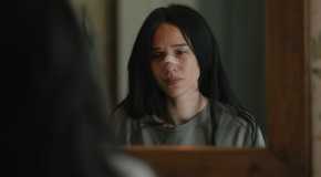 Monica Dutton (Kelsey Asbille) looking at her injured face in the mirror in Yellowstone season 5 episode 2