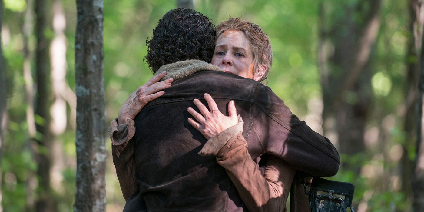 Rick Grimes (Andrew Lincoln) and Carol Peletier (Melissa McBride) hugging in The Walking Dead