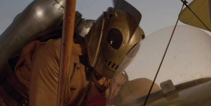 The Rocketeer in costume flying with his jetpack