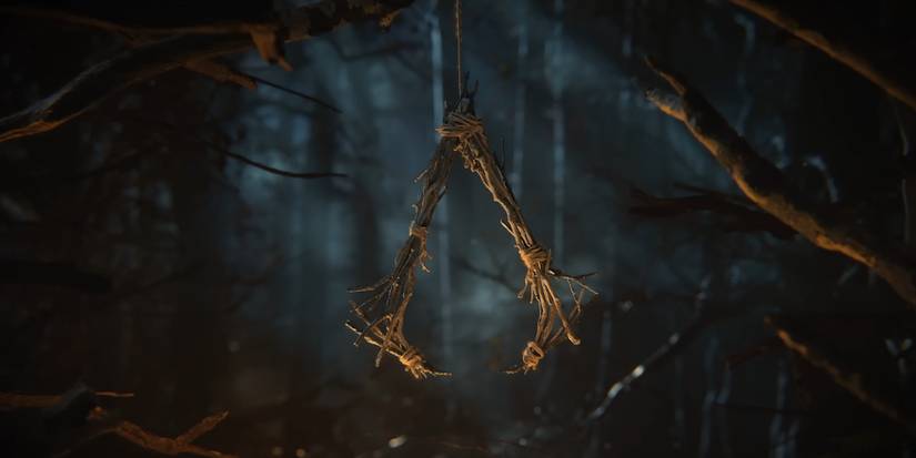 הלוגו של Assassin's Creed Hexe, שהופך את הלוגו של הזיכיון לקסם עץ מוזר