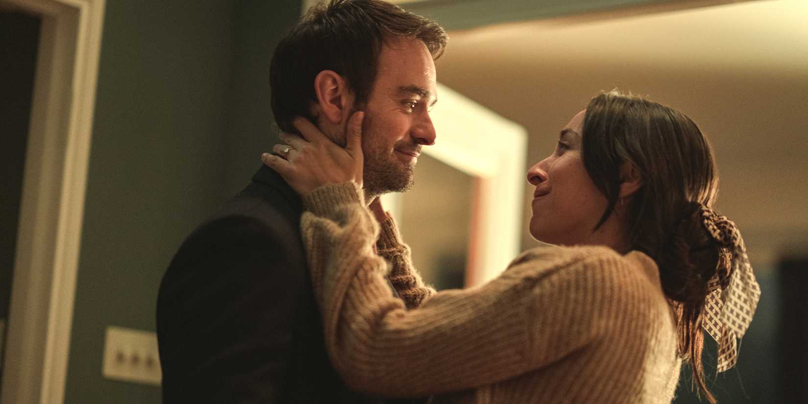 charlie cox as adam lawrence and oona chaplin as maddy in treason