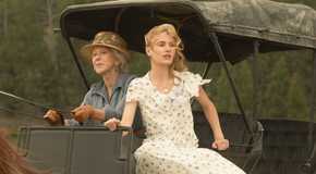 elizabeth strafford and her mother riding a carriage in 1923