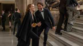 Sylvie and Laurent on a staircase in Emily in Paris