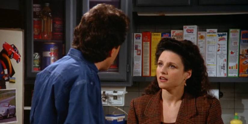 Jerry talking to Elaine at his apartment in Seinfeld.