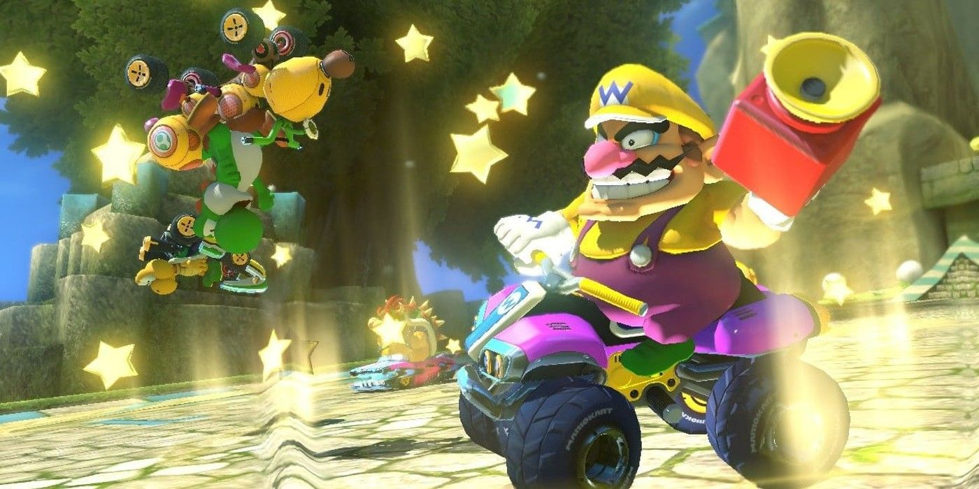 Wario knocking away opponents with a Super Horn in Mario Kart