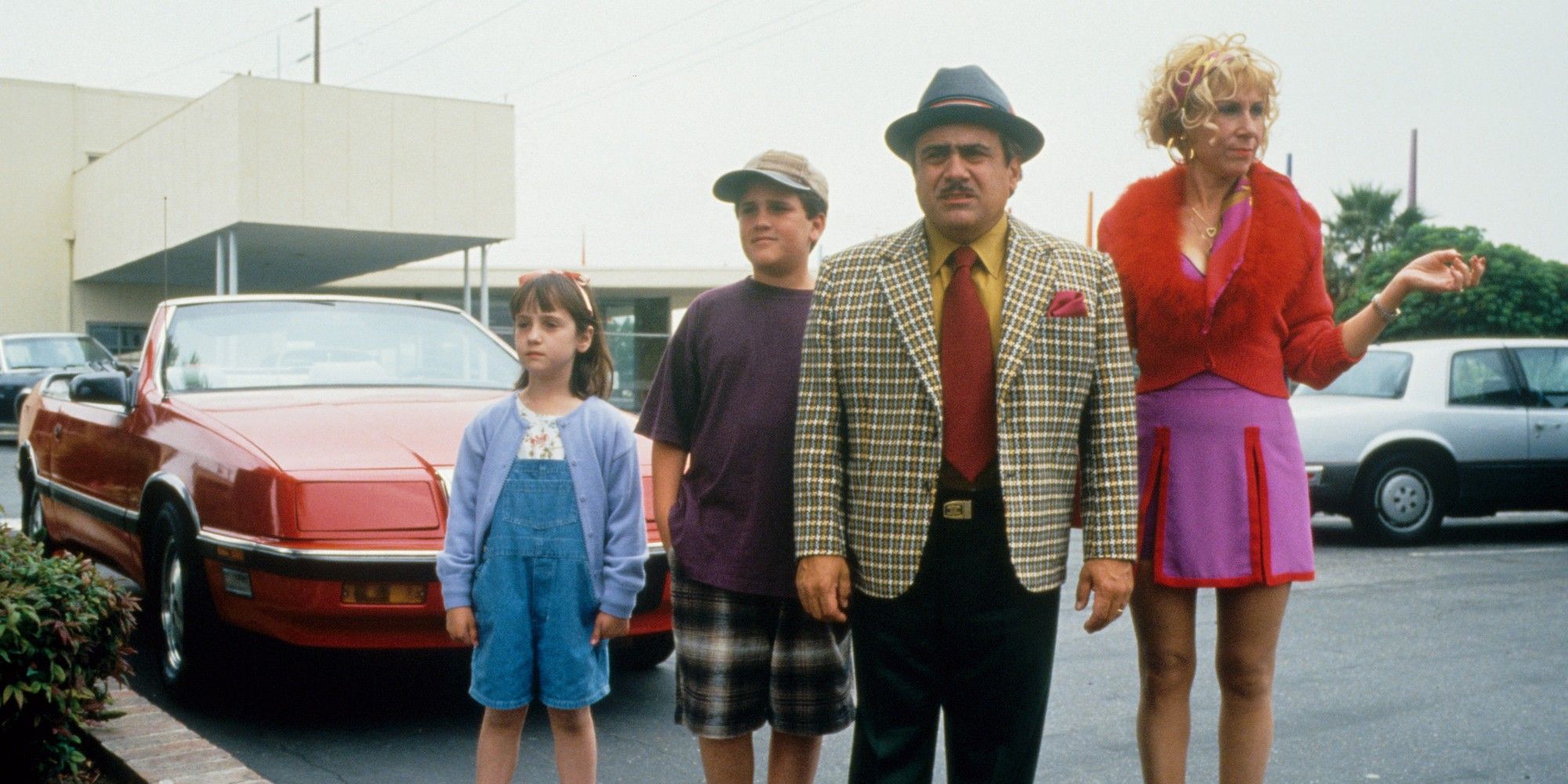 Matilda and the Wormwood Family in a parking lot