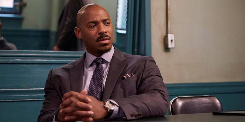Mehcad Brooks as Jalen Shaw listening to someone in the interrogation room in Law & Order