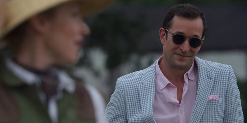 Noah Wyle smiling in Leverage Redemption