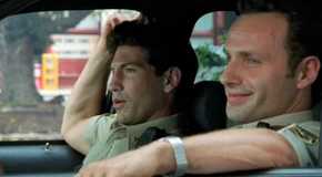 Rick (Andrew Lincoln) and Shane (Jon Bernthal) in police uniforms in The Walking Dead