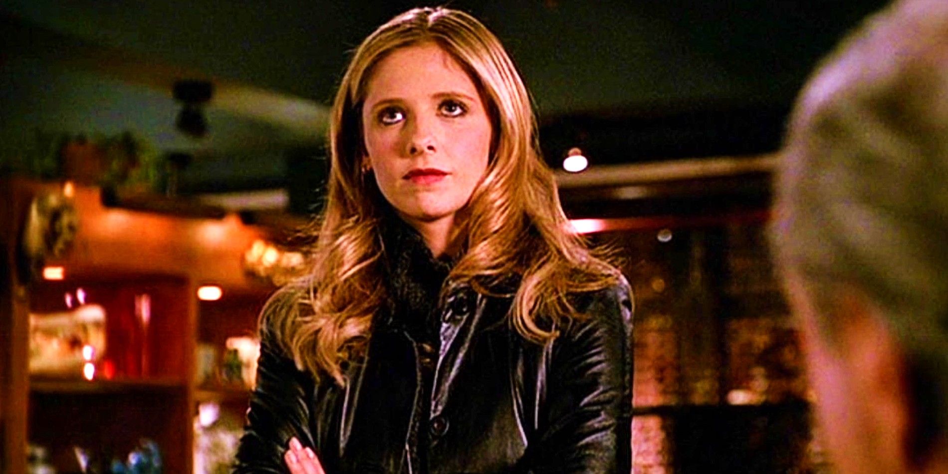 Sarah Michelle Gellar as Buffy Summers looking determined in Buffy the Vampire Slayer