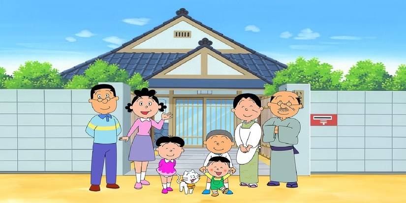 Sazae San and her family wave at the camera in front of their house