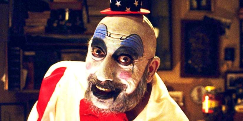 Sid Haig as Captain Spaulding smiling at the camera in House of 1000 Corpses
