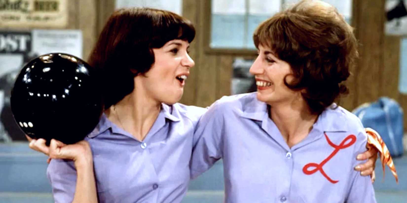Laverne and Shirley staring at each other and smiling on Laverne and Shirley