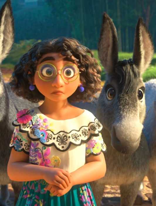Mirabel surrounded by several donkeys and looking shocked in Encanto