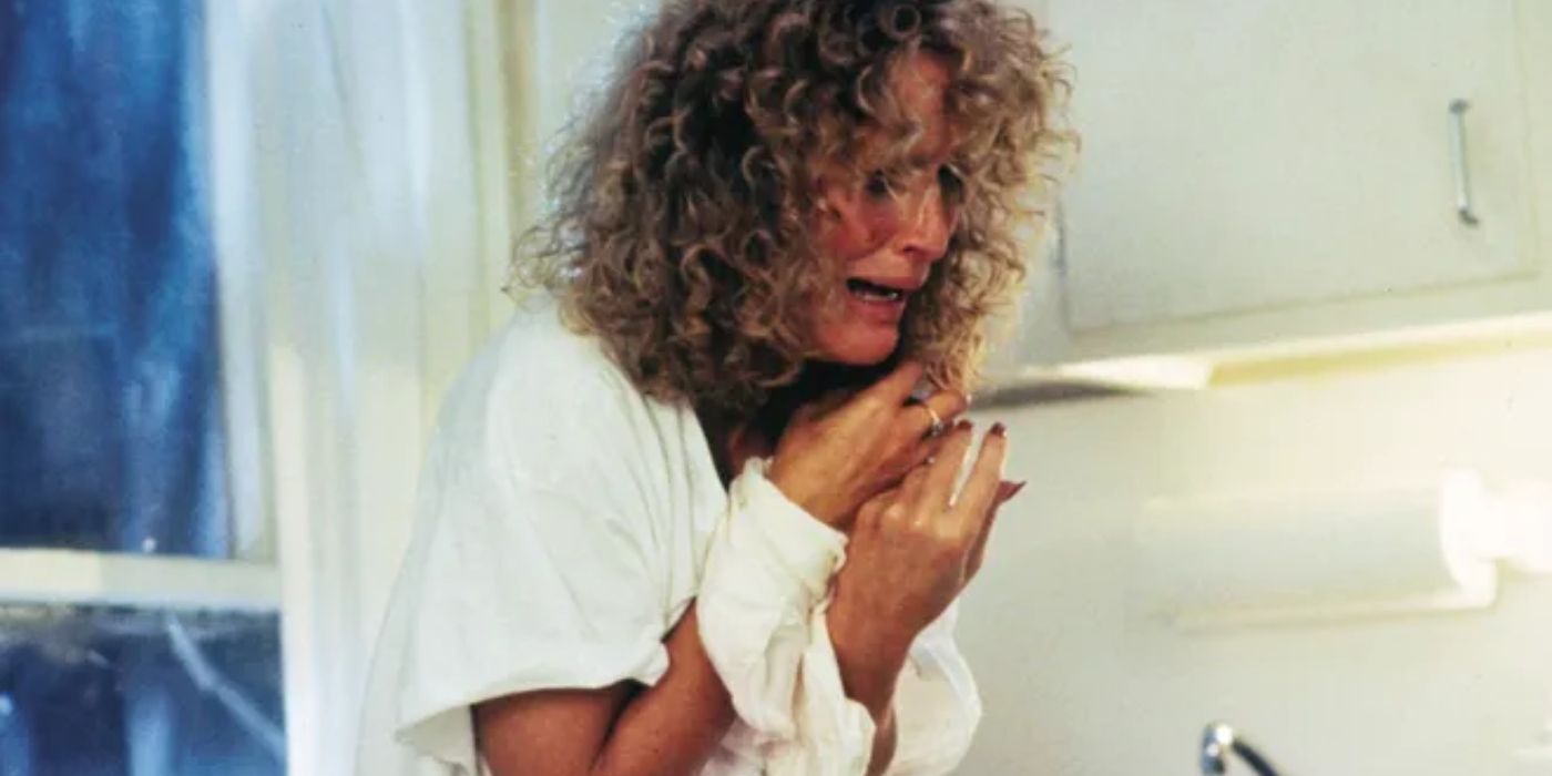 Glenn Close as Alex crying and holding her hands up in Fatal Attraction