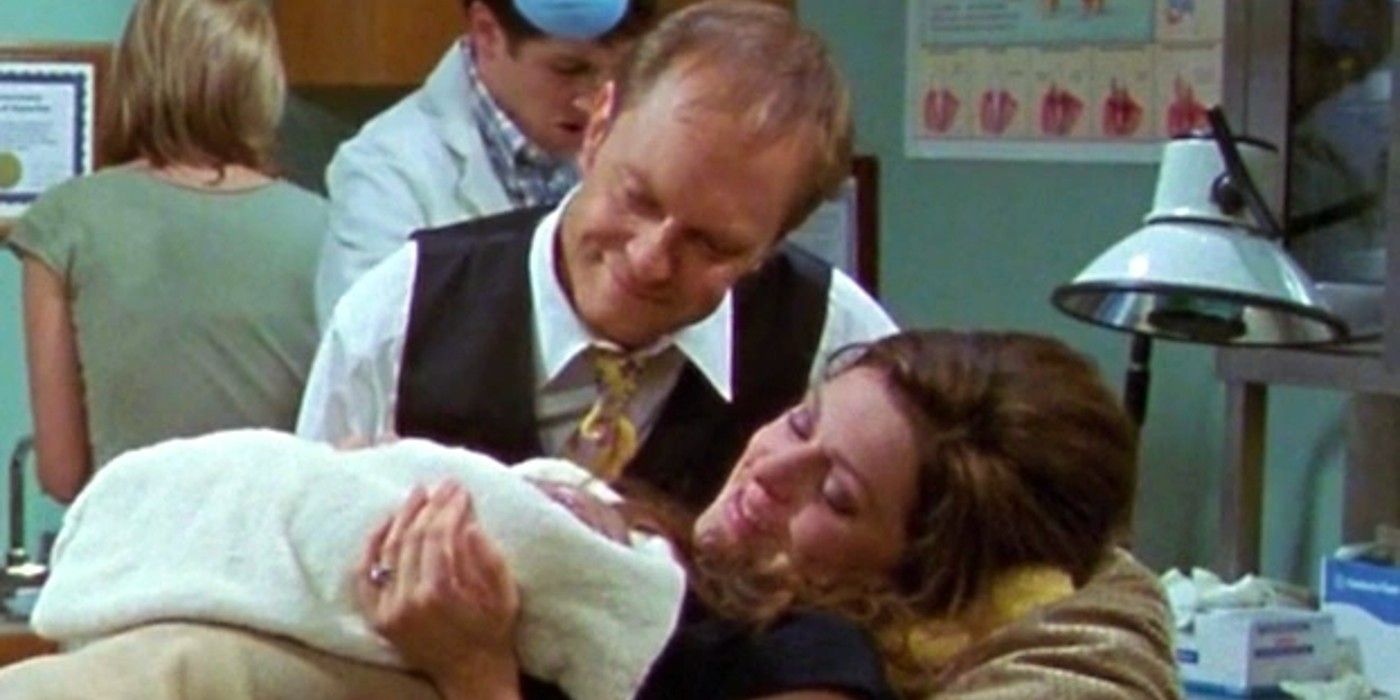 Niles and Daphne looking at their son in Frasier