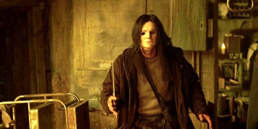 O assassino segurando uma faca em Casa de Cera