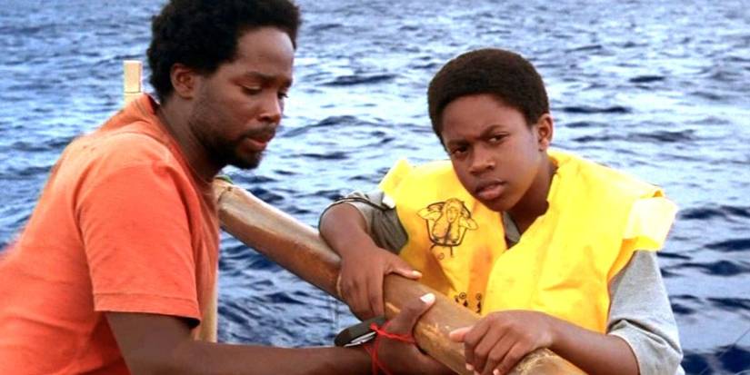 Harold Perrineau and Malcolm David Kelley as Michael and Walt on a boat in Lost