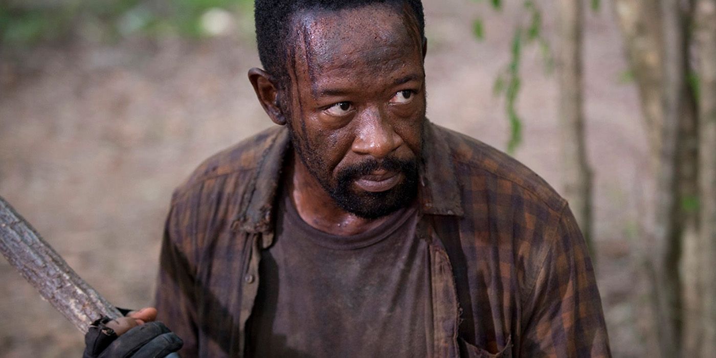 Lennie James as Morgan looking intense while holding a weapon in The Walking Dead