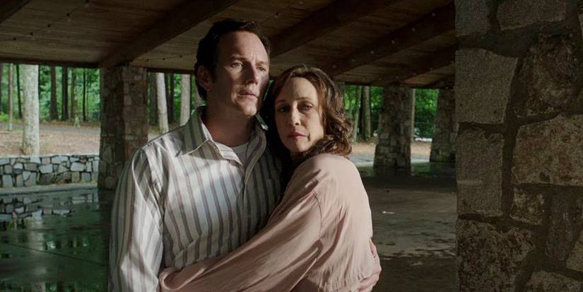 Patrick Wilson and Vera Farmiga as the Warrens hugging in The Conjuring The Devil Made Me Do It