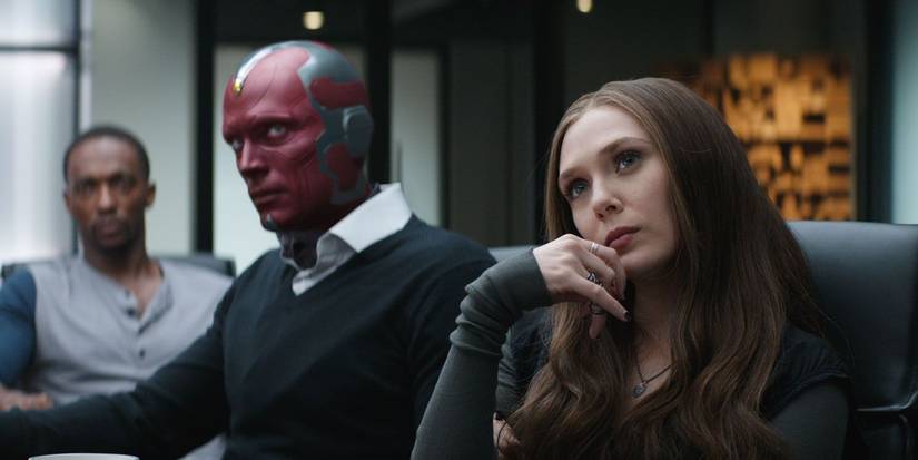Sam Wilson, Vision and Wanda Maximoff seated in Avengers Compound in Captain America Civil War