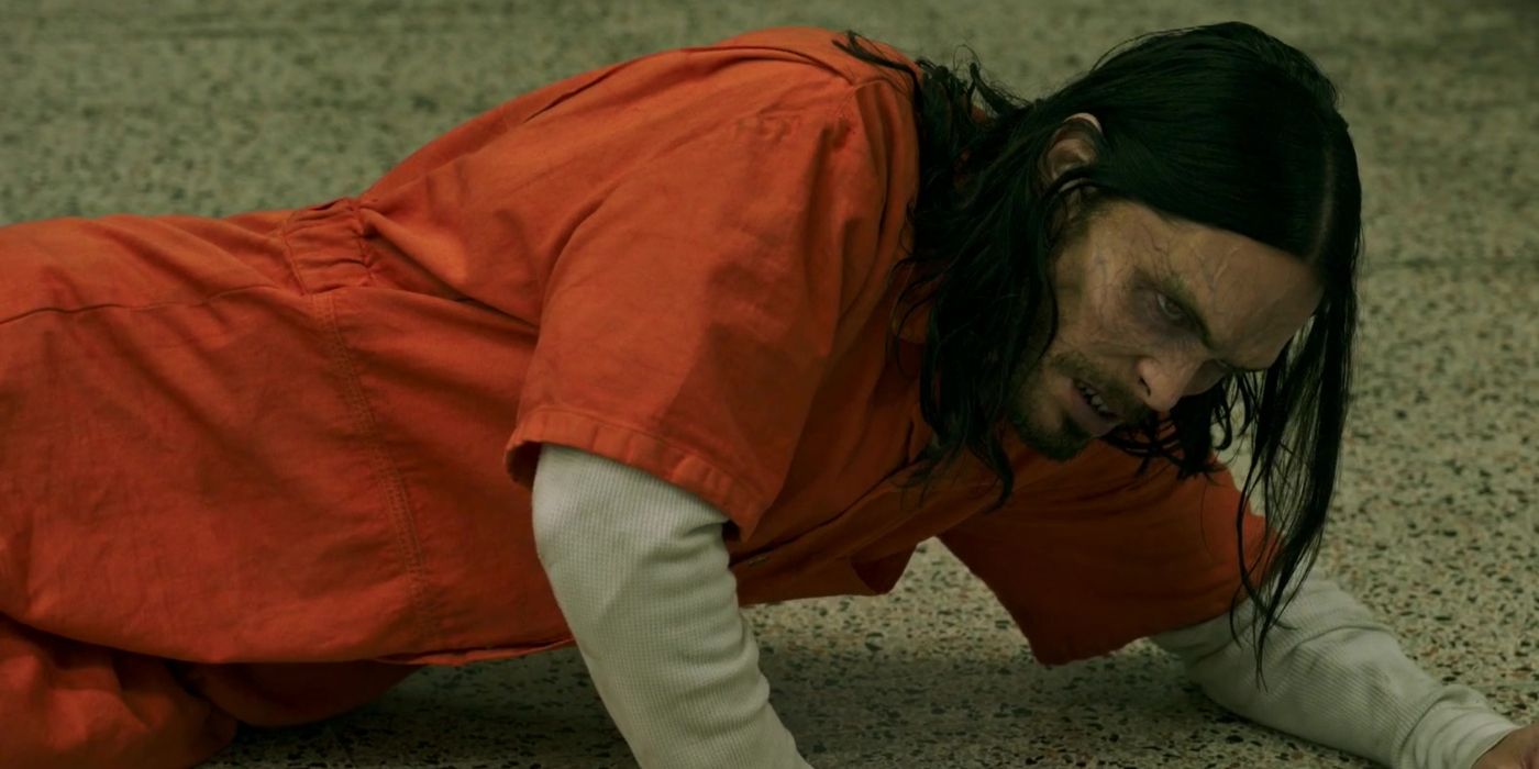 Jared Leto as Michael Morbius lying on the floor in Morbius