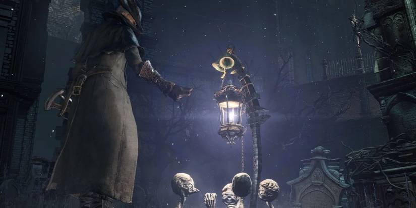 The Hunter lightning a lamp in Bloodborne.