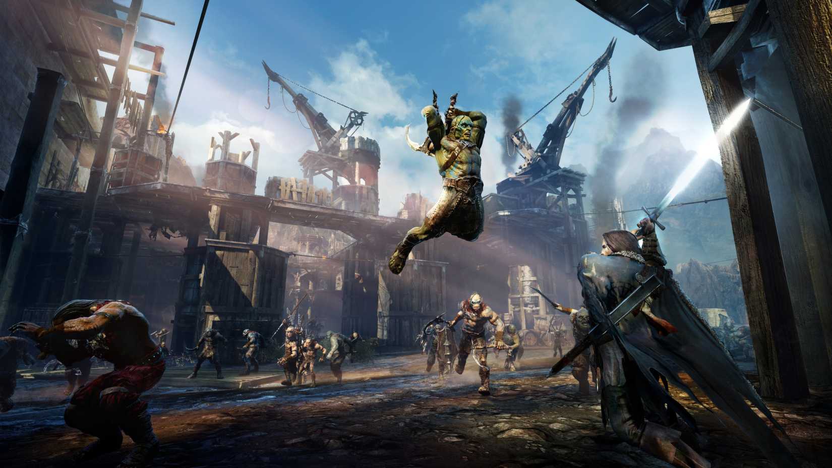shadow of mordor screenshot of orcs attacking player character at wooden barracks