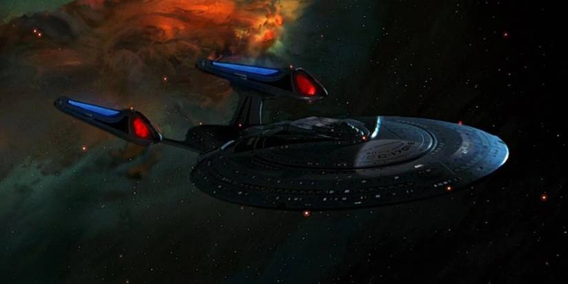 The Enterprise-E soars out of a nebula from Star Trek First Contact