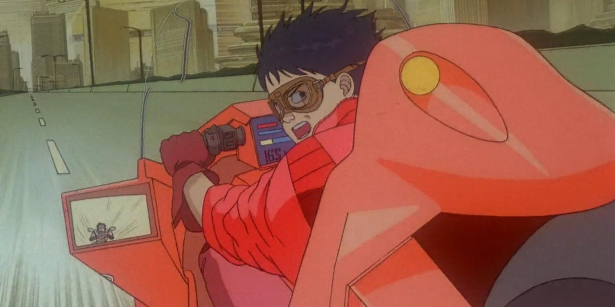 Kaneda on his motorcycle in Akira, speeding through the streets of Tokyo.