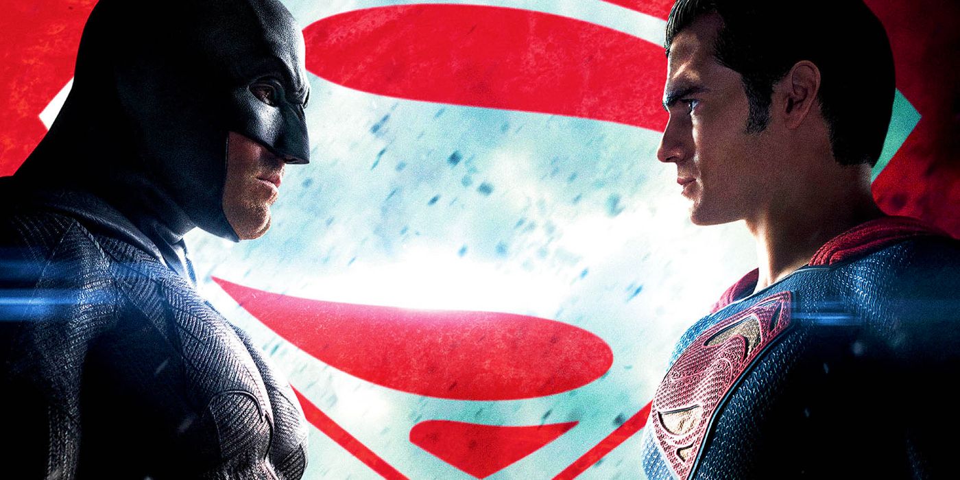 Ben Affleck's Batman and Henry Cavill's Superman staring each other down in front of the BvS logo