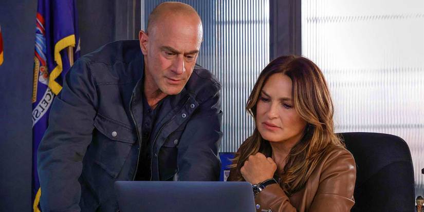Elliot Stabler and Olivia Benson looking at a computer screen in Law and Order SVU.