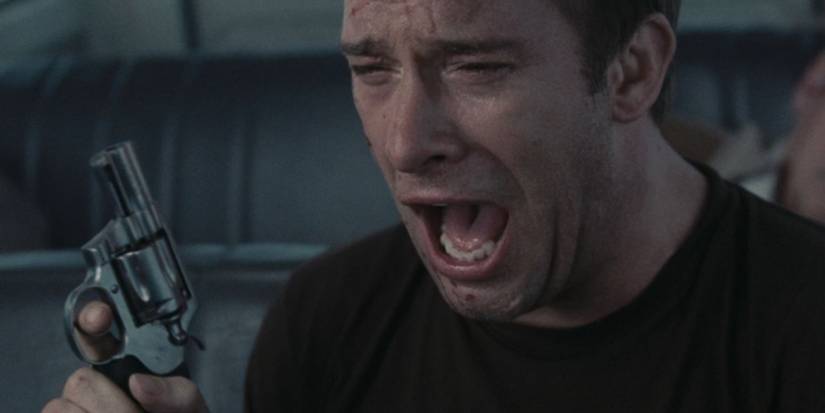 David (Thomas Jane) schreit in „The Mist“ mit einer Waffe in der Hand