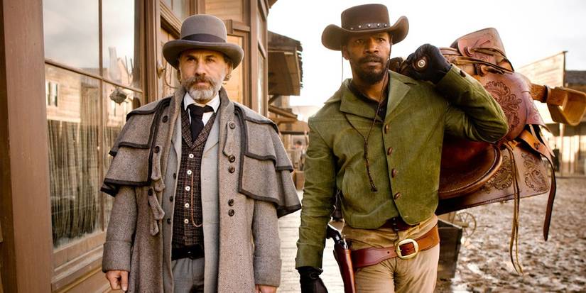 Django and Dr Schultz walk through town in Django Unchained