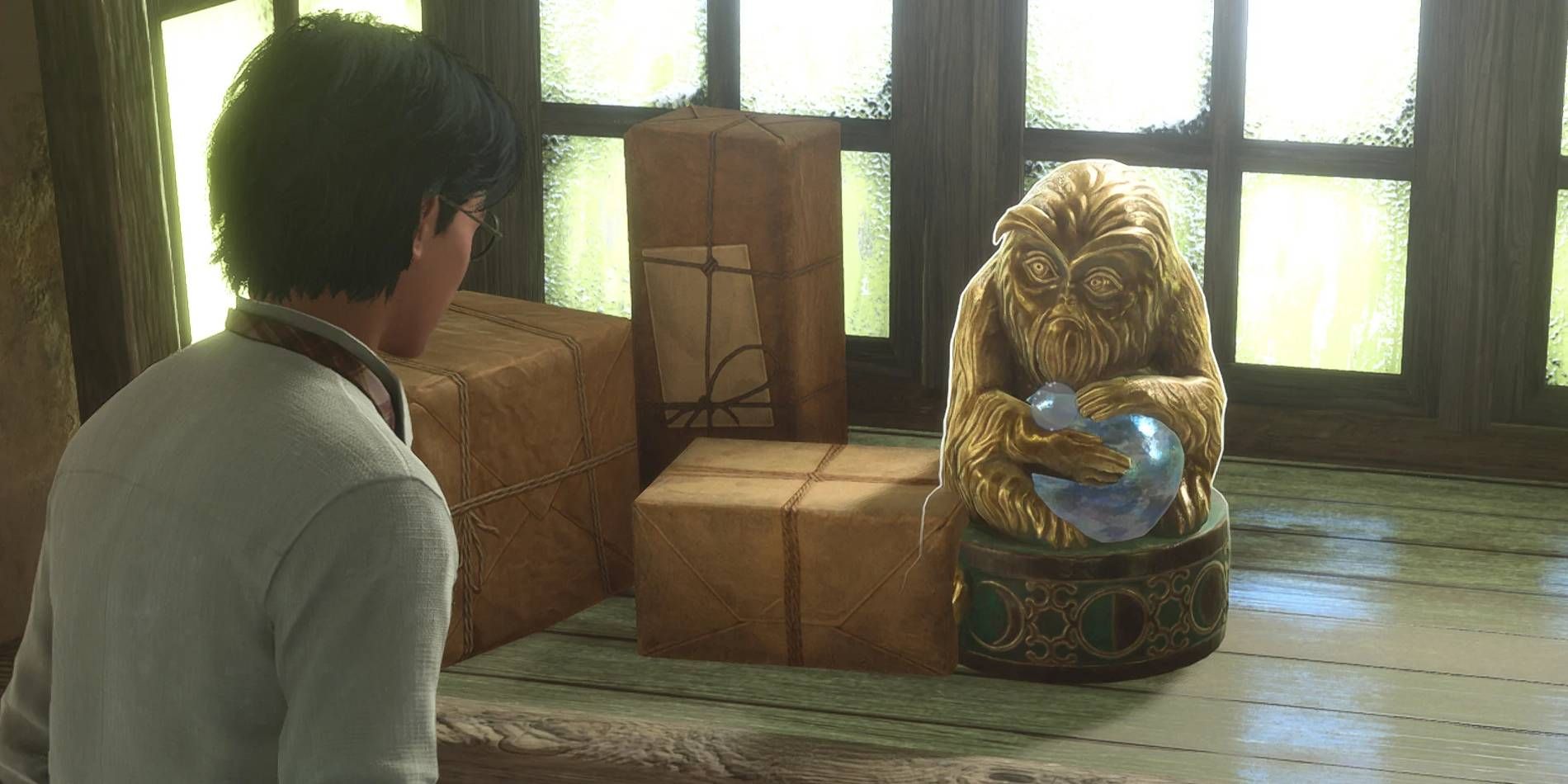 Demiguise Statues en Hogwarts Legacy dentro del castillo de Hogwarts durante la noche