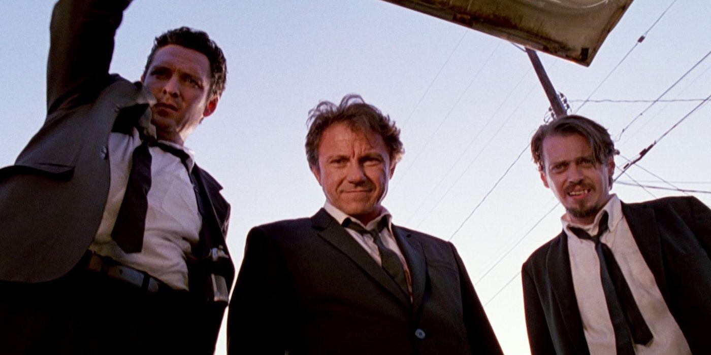 Mr Blonde, Mr White, and Mr Pink looking into a trunk in Reservoir Dogs