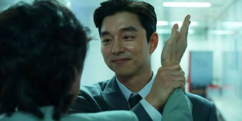 Gi-hun trying to slap a recruiter in Squid-Game