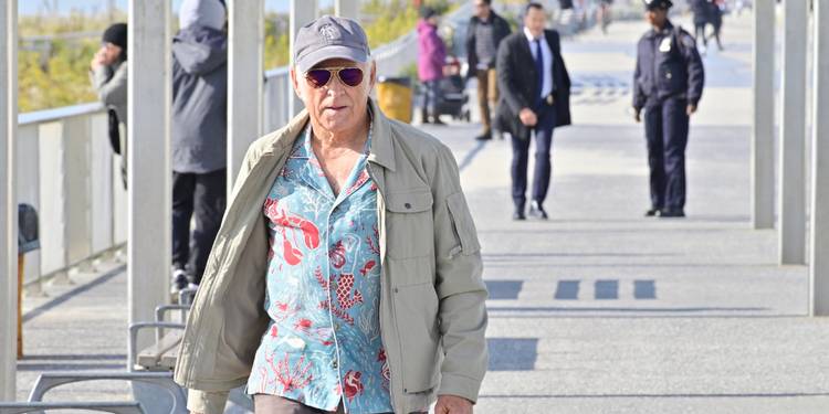 Jimmy Buffett walks on a boardwalk in Blue Bloods