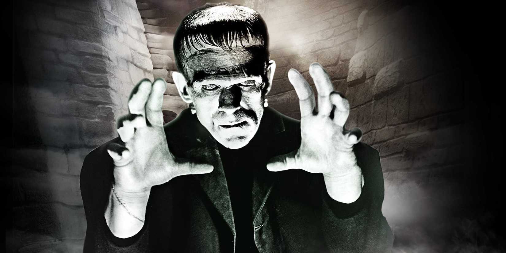boris karloff as frankenstein reaching toward the camera