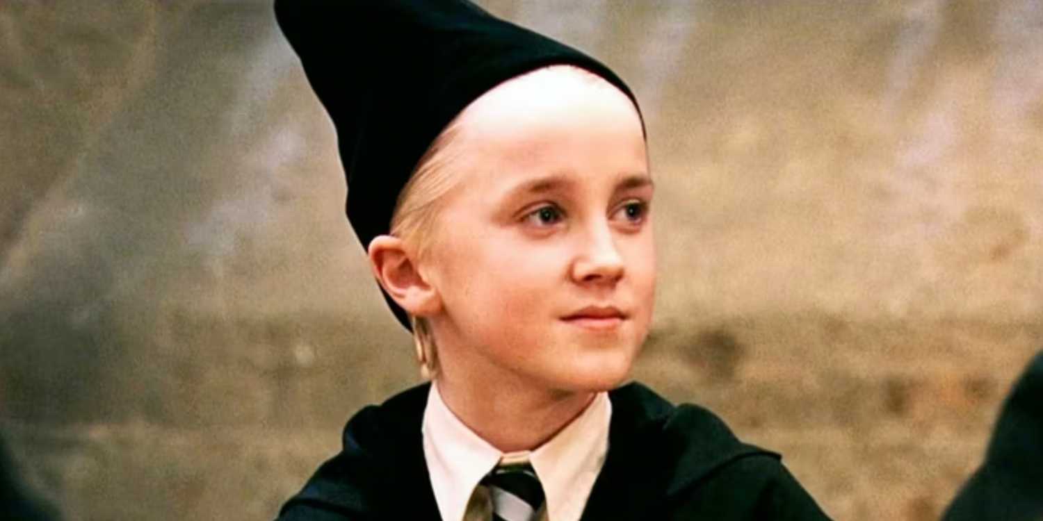 draco-malfoy-in-a-pointed-wizard-hat-in-harry-potter-and-the-sorcerers-stone How Old The Harry Potter Cast Was Compared To Their Characters