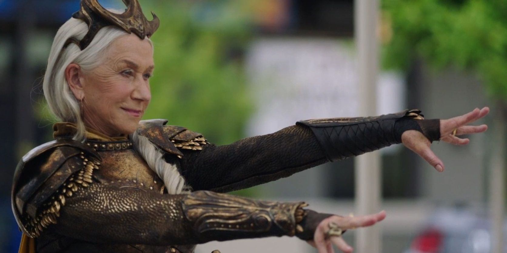 Helen Mirren as Hespera holding out her hands in Shazam Fury of the Gods