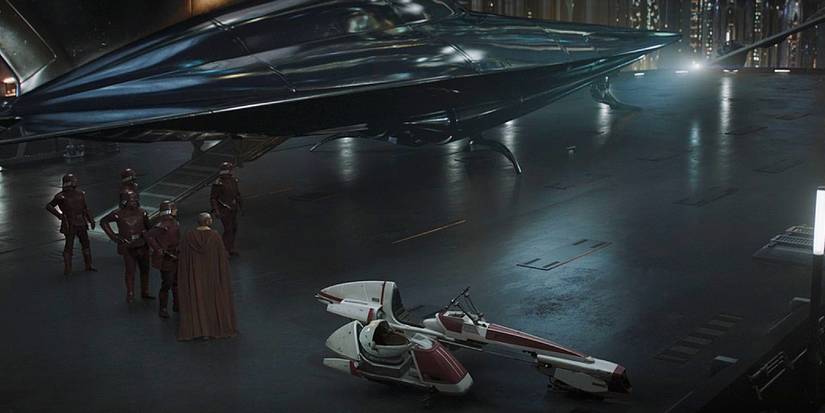 Naboo guards next to a Nubian yacht help Grogu and Kelleran Beq escape Order 66