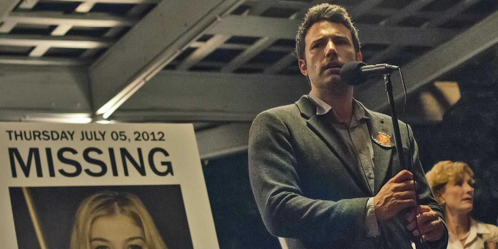 nick_in_front_of_amy-s_missing_poster_in_gone_girl David Fincher’s R-Rated Thriller That Grossed 6x Its Budget Is Coming To Paramount+ In 2 Weeks