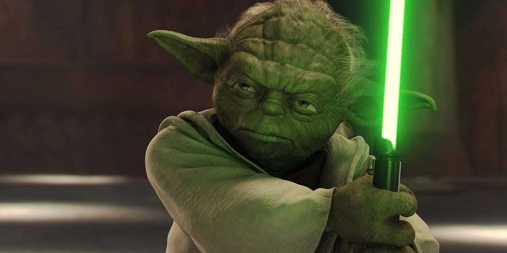 Yoda brandishing a green treatment saber in attack of the clones
