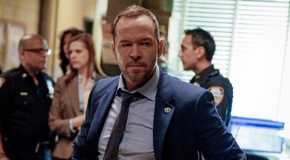 Donnie Wahlberg as Danny looking furious with people talking in the background on Blue Bloods