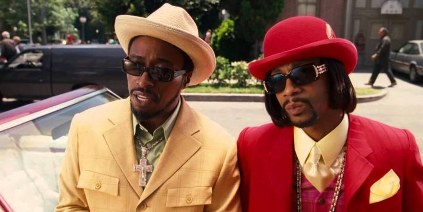 Eddie Griffin and Katt Williams standing by a car in Norbit